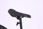 Close-up of the saddle on the 6725 Axis 700c Commuter Bike showcasing its design and build quality.