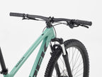 2026 Trek Marlin 4 Gen 3 Mountain Bike handlebar and fork close-up showing design details.