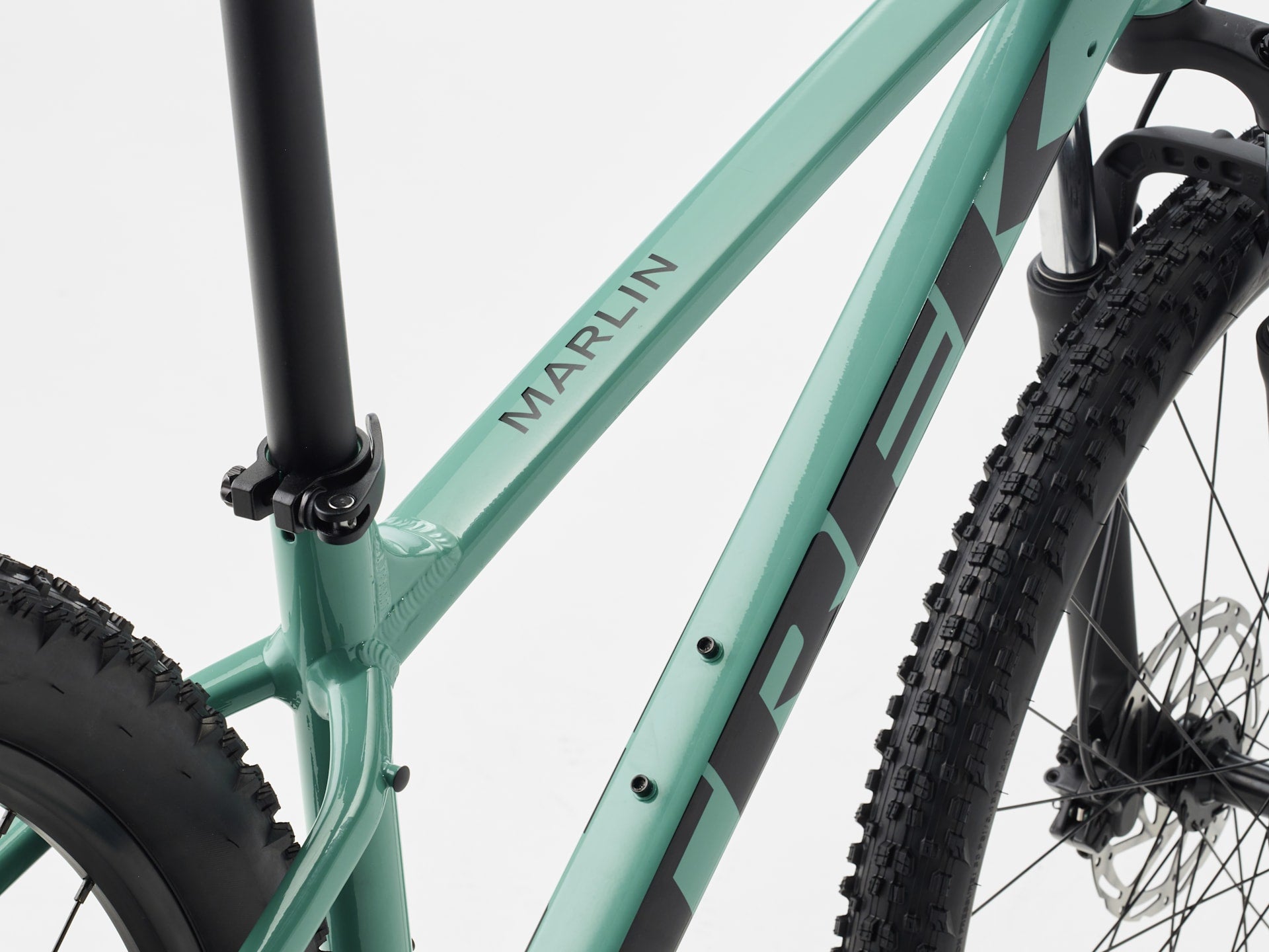 2026 Trek Marlin 4 Gen 3 Mountain Bike frame detail showcasing the Marlin branding and tire tread.