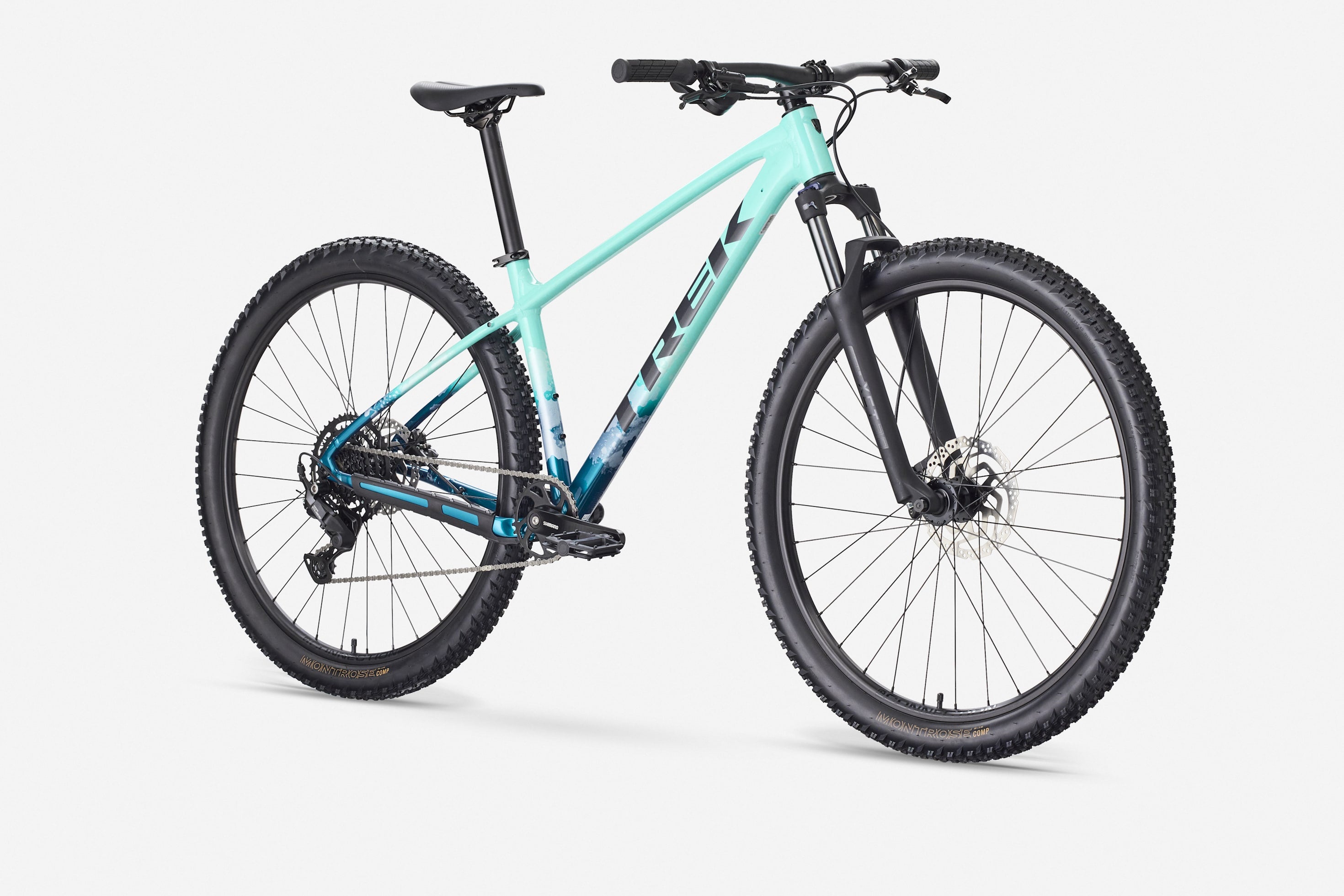 side profile of Trek Marlin 5 Gen 3 hardtail mountain bike with suspension fork and wide tyres