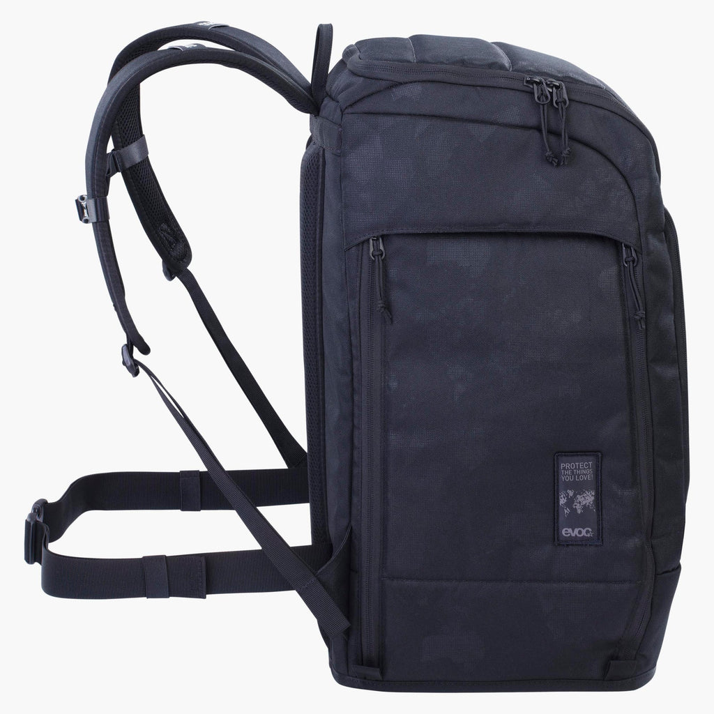 side profile of Evoc 60L ski gear bag with padded straps and hip belt